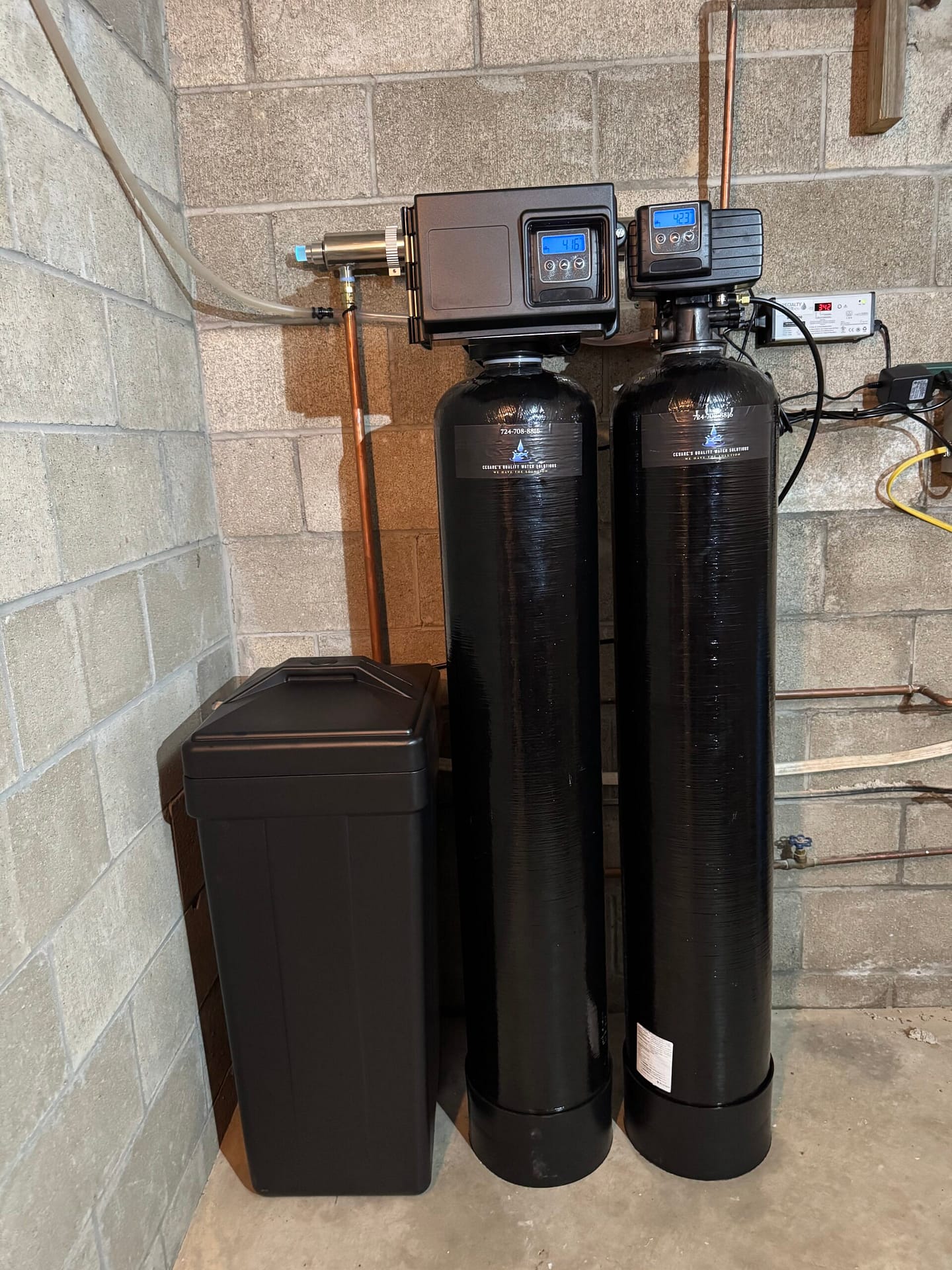 Cesare's Quality Water Solutions UV disinfection system installation with whole-house filtration